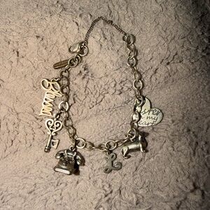 James Avery bracelet. Contains Retired collectible silver hello my love charm !!